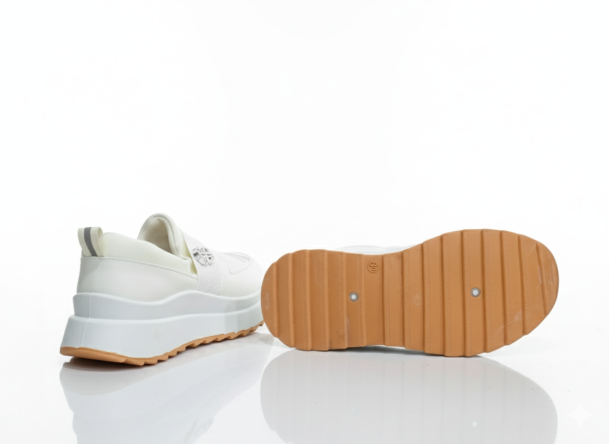 White sneaker with brown sole