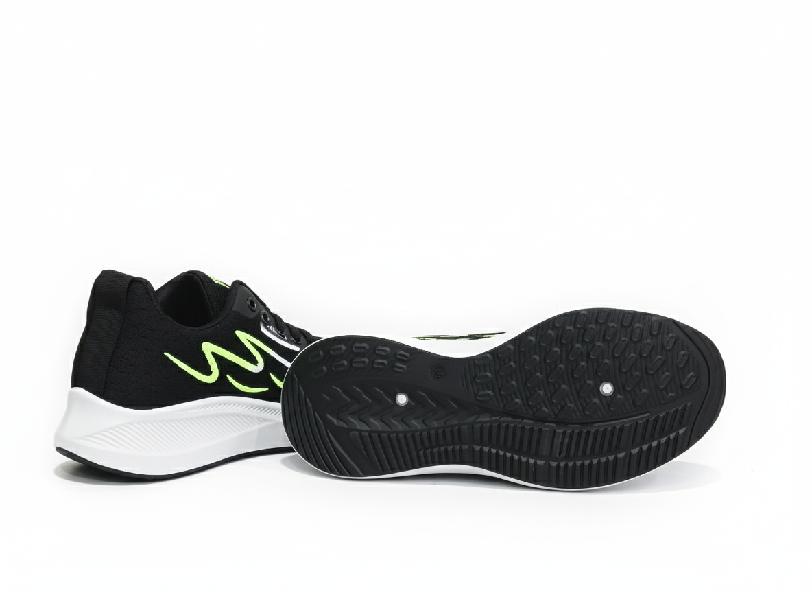 Black running shoes with green accents 