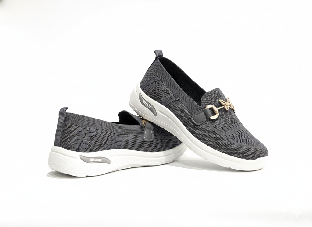Pair of Grey loafers with gold accents 
