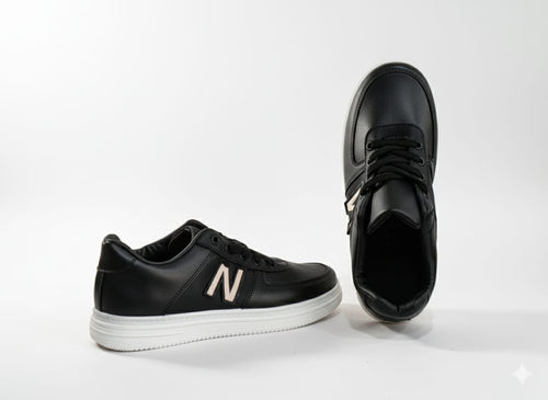 Black sneakers with a text "N"