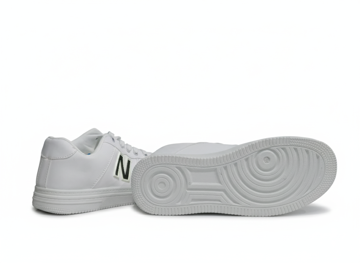 White sneakers with a text "N" Sole